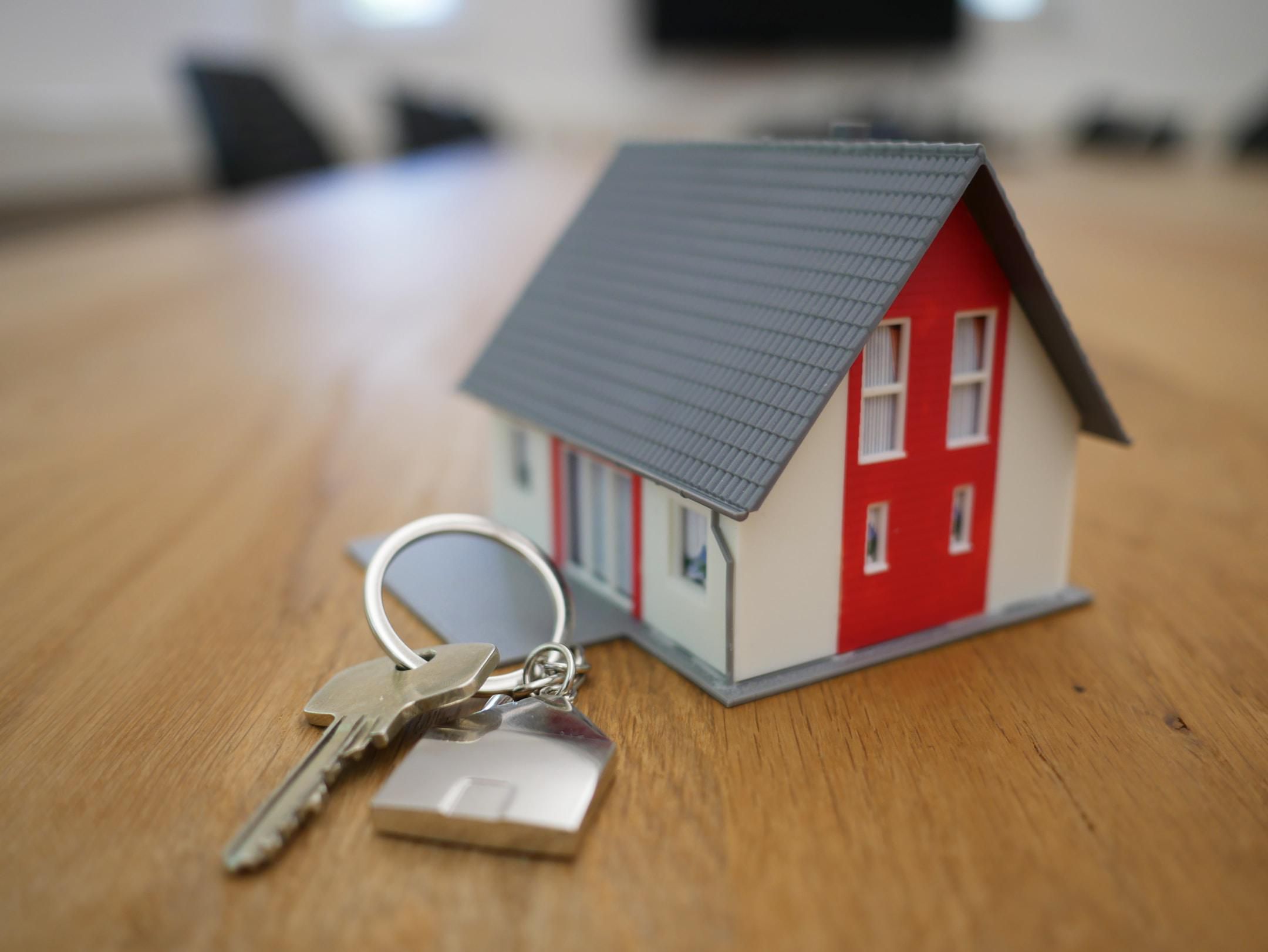 keys next to a model house