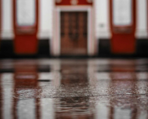 reflection-of-building-in-puddle