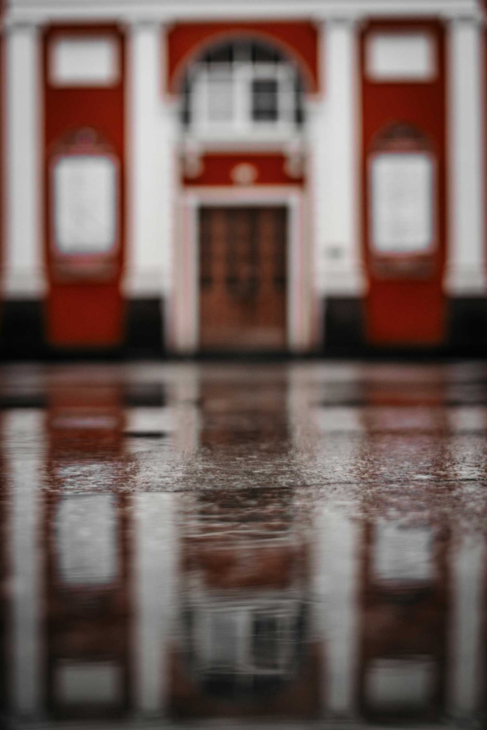 reflection-of-building-in-puddle